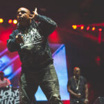 Vin Rock performs with Treach and DJ Kay Gee onstage during a Naughty by Nature concert.