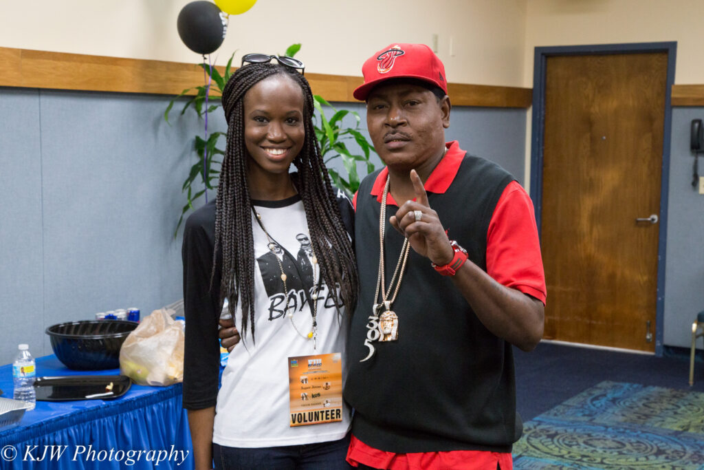 Rapper Trick Daddy with a woman at Florida International University's Biscayne Bay Campus.
