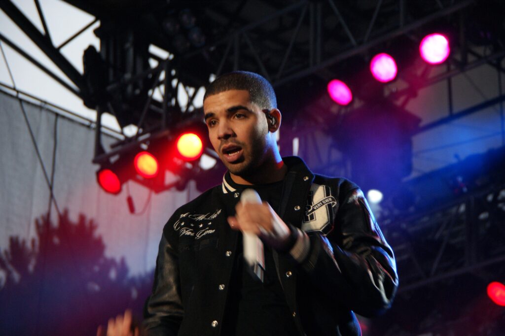 Drake performing onstage in 2010