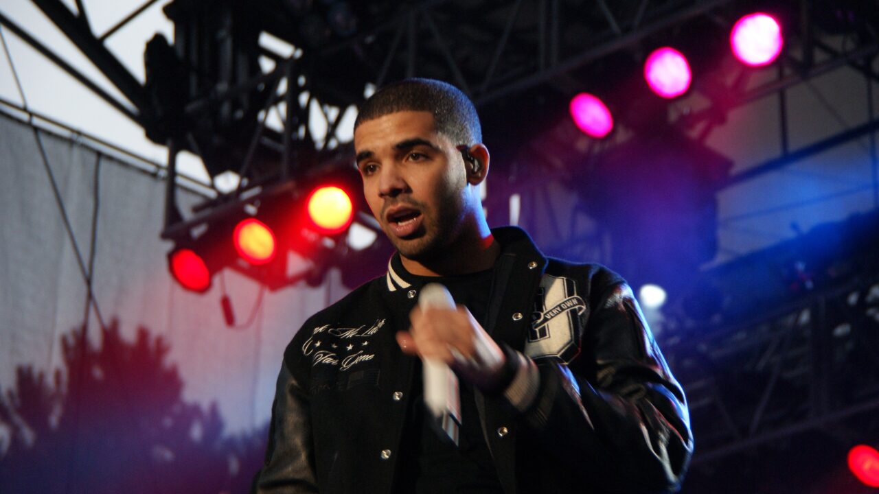 Drake performing onstage in 2010