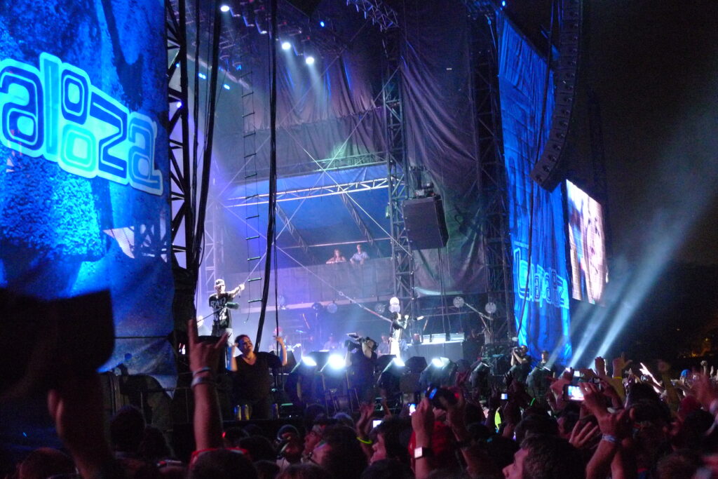 Eminem performing onstage at the 2011 Lollapalooza festival