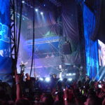 Eminem performing onstage at the 2011 Lollapalooza festival