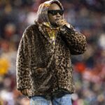 Rapper Wale performs at halftime during a 2021 Monday Night Football game at FedEx Field.
